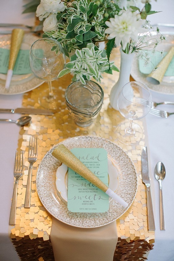 Gold and mint place setting