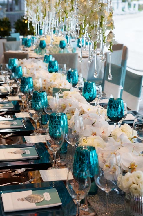 all white floral with turquoise and silver accented tablescape